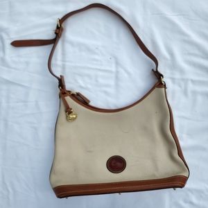 Dooney & Bourke vintage small  hobo bag purse  all weather leather Amazing.